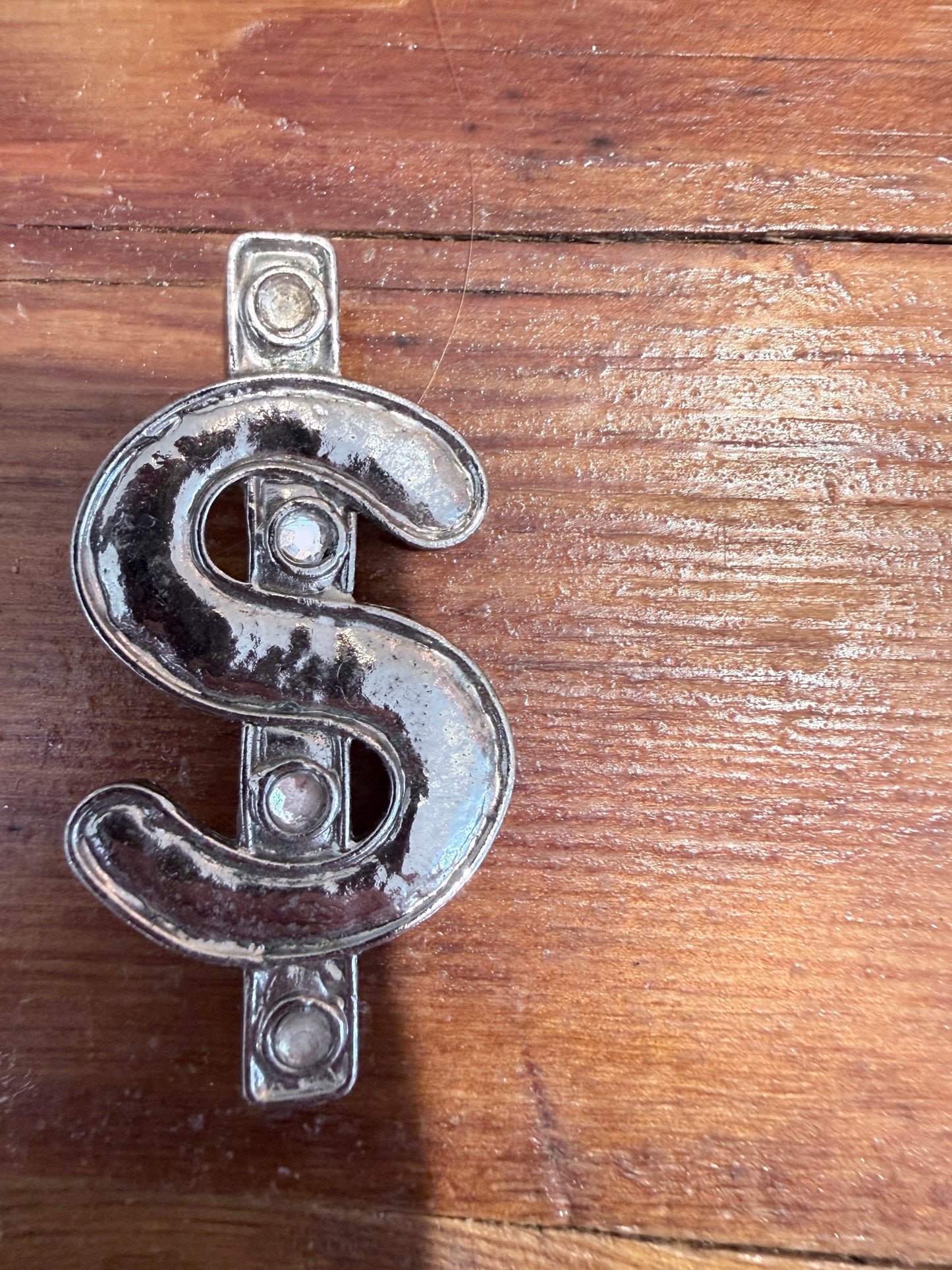 Dollar sign Broche